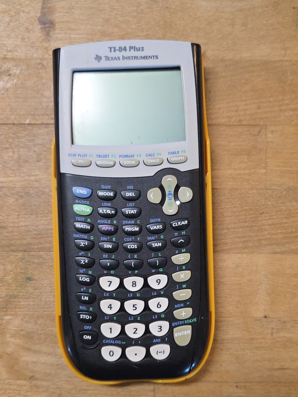Texas Instruments TI-84 Plus Graphing Calculator - Black with Yellow Trim